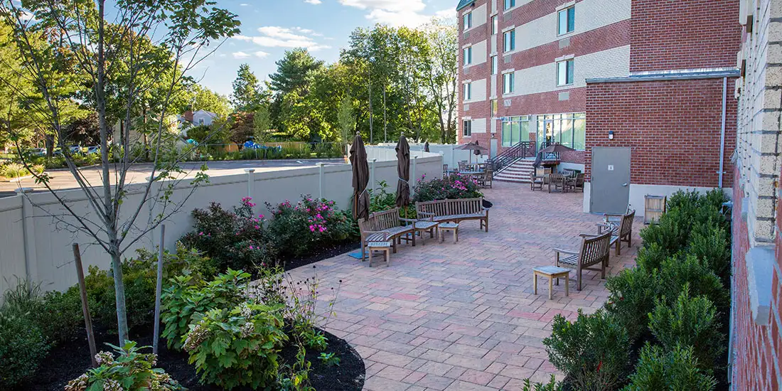 Island Assisted Living Patio / Exterior (Looking for Medicaid or Medicare Assisted Living? Contact us Today)